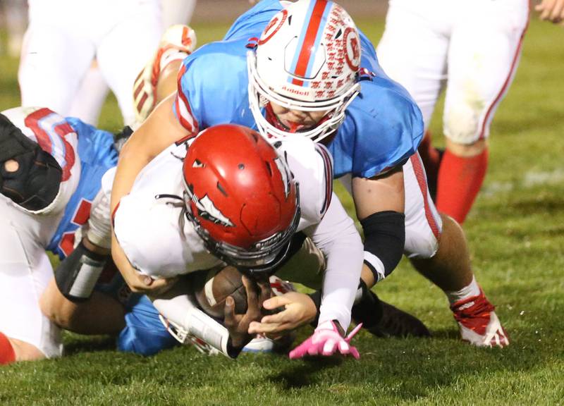 Ottawa's Ethan Poutre makes the sack on Granite City's Dexter McClendon on Friday, Oct. 24, 2025 on Kingman Field at Ottawa High School.