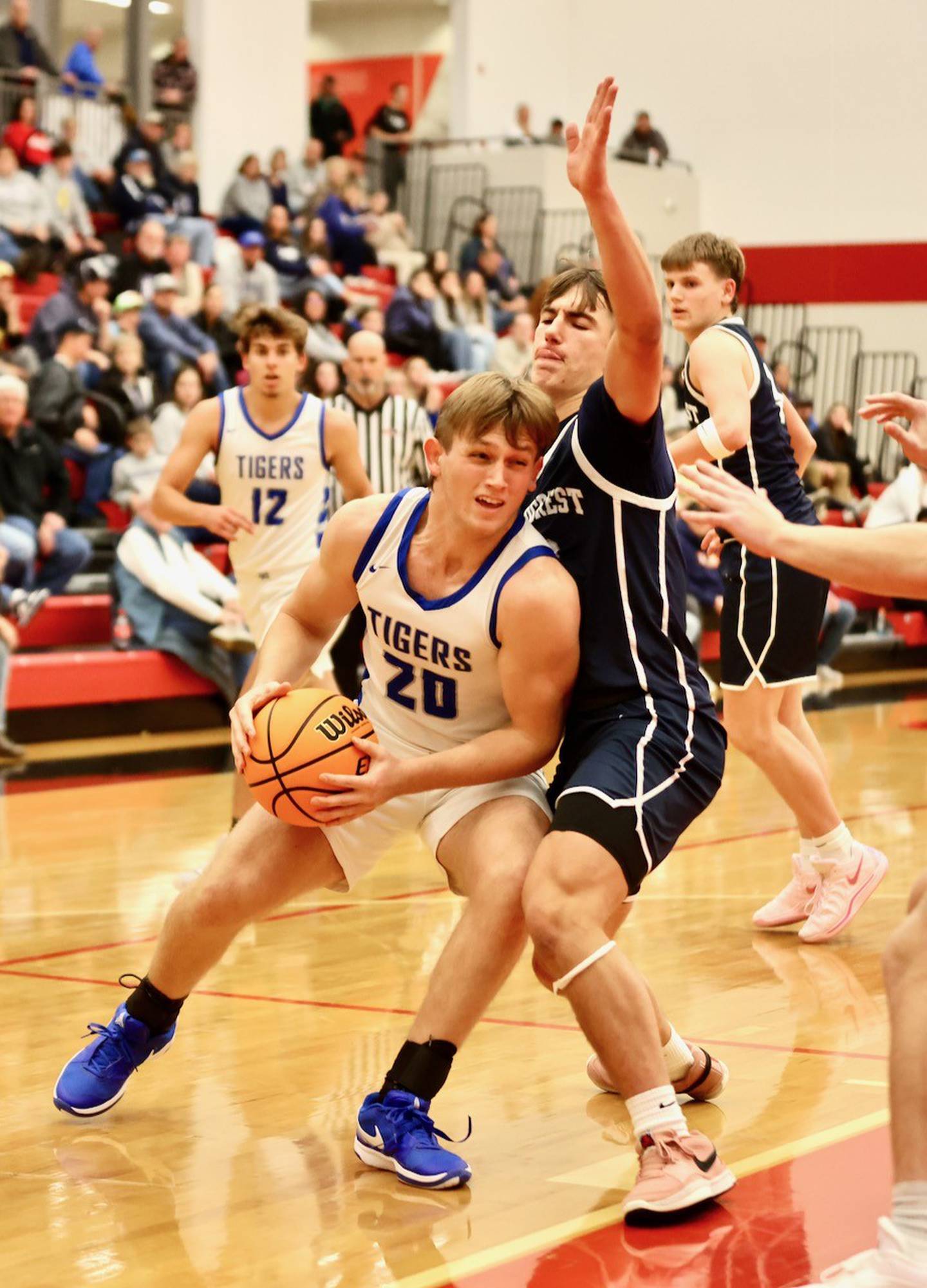 Princeton's Arthur Burden powers up against Fieldcrest Tuesday night at Hall High School.