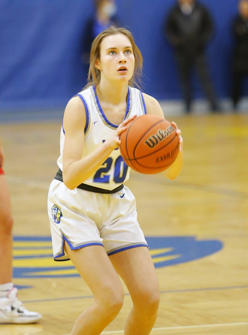 Lyons' Ella Ormsby (20) takes a free throw during the girls varsity basketball game between Benet Academy and Lyons Township on Wednesday, Nov. 30, 2022 in LaGrange, IL.