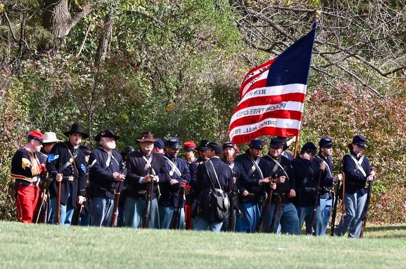 Union Soldiers prepare for the Civil War reenactment during the Shadows of the Blue and Gray event on Sunday, Oct. 13, 2024 at City County Park in Princeton.