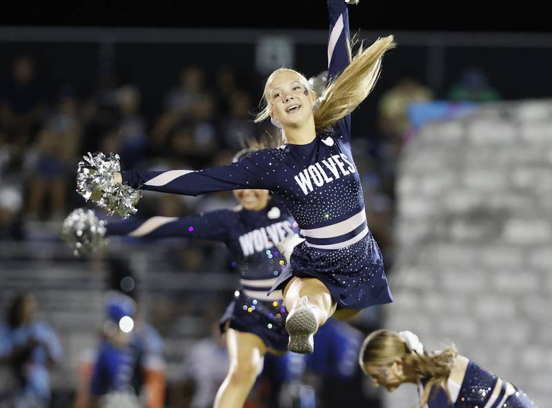 Oswego East's dance team performs at halftime during the varsity football game between Plainfield South and Oswego East on Friday, Sep. 20, 2024 in Oswego.