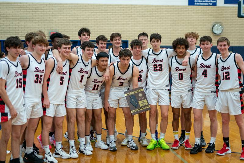 Benet celebrates their victory over Bartlett for the 4A Addison Trail Regional Championship at Addison Trail High School in Addison on Friday, Feb 24, 2023.