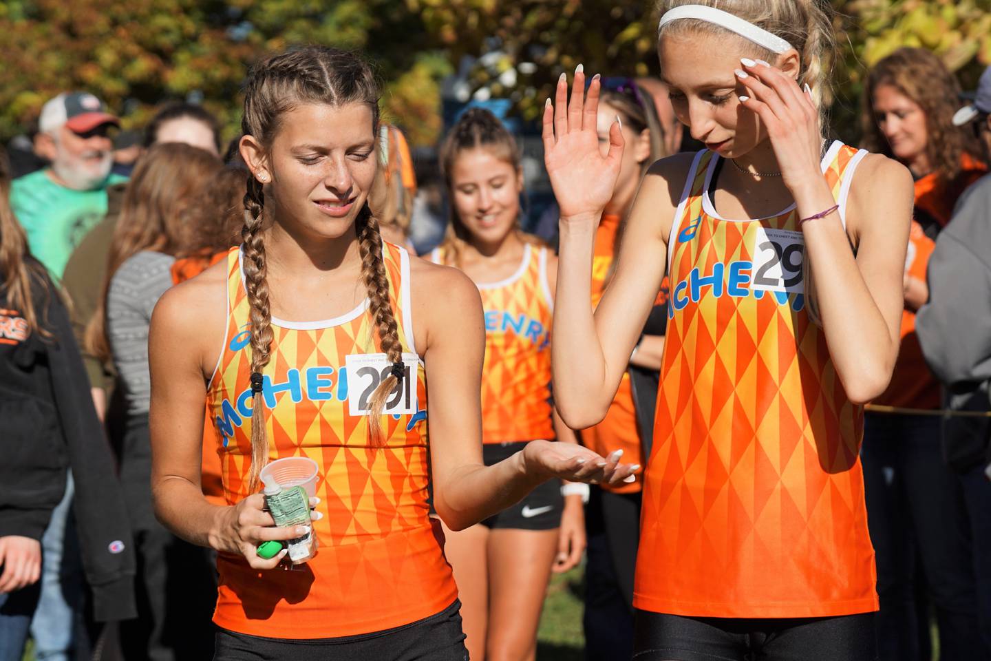 McHenry's Alyssa Moore (23rd) and Lynda Rotundo (12th) at Saturday's Class 3A Hoffman Estates Cross Country Sectional. The Warriors are headed to state for the first time.