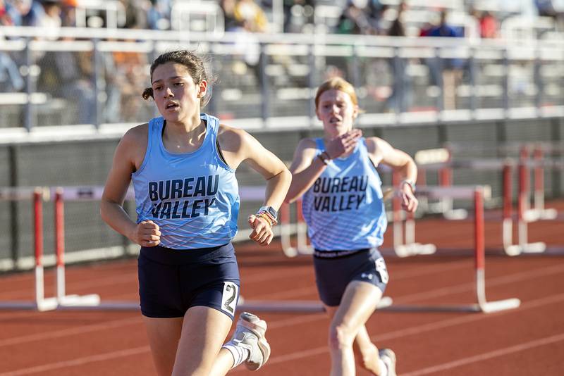 Bureau Valley’s Maddie Wetzell (left) and Summer Hamilton race for the finish in the 3200 run Wednesday, May 13, 2026, during the Class 1A Erie Sectional meet.