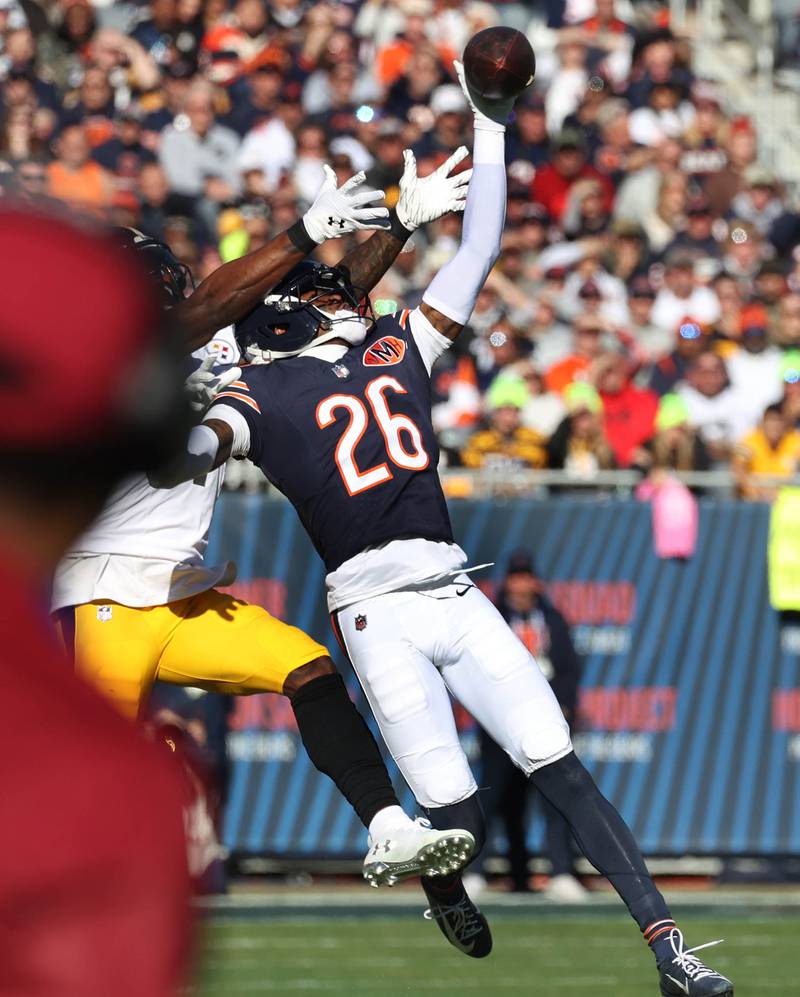 Chicago Bears cornerback Nahshon Wright intercepts Pittsburgh Steelers quarterback Mason Rudolph Sunday, Nov. 23, 2025, during their game at Soldier Field in Chicago.