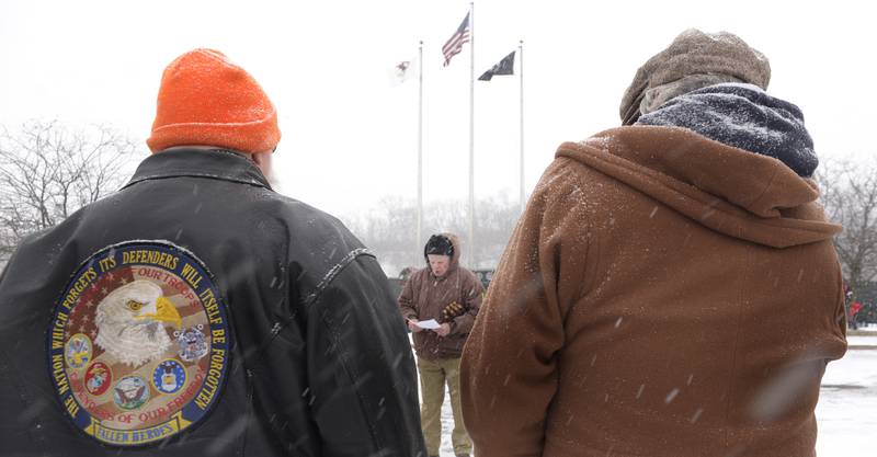 Crowds brave the snowy and frigid conditions Saturday to hear speeches and prayers during the Wreaths Across America ceremony at the Middle East Conflicts Wall Memorial in Marseilles