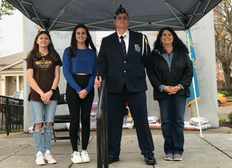 US Army veteran Matt Weaver (second from right) is suffering from liver failure and will be the subject of a benefit next Saturday at the Ottawa American Legion Post 33. With Weaver above are his daughters Sheyanne and Rhiannon and his wife, Julie.
