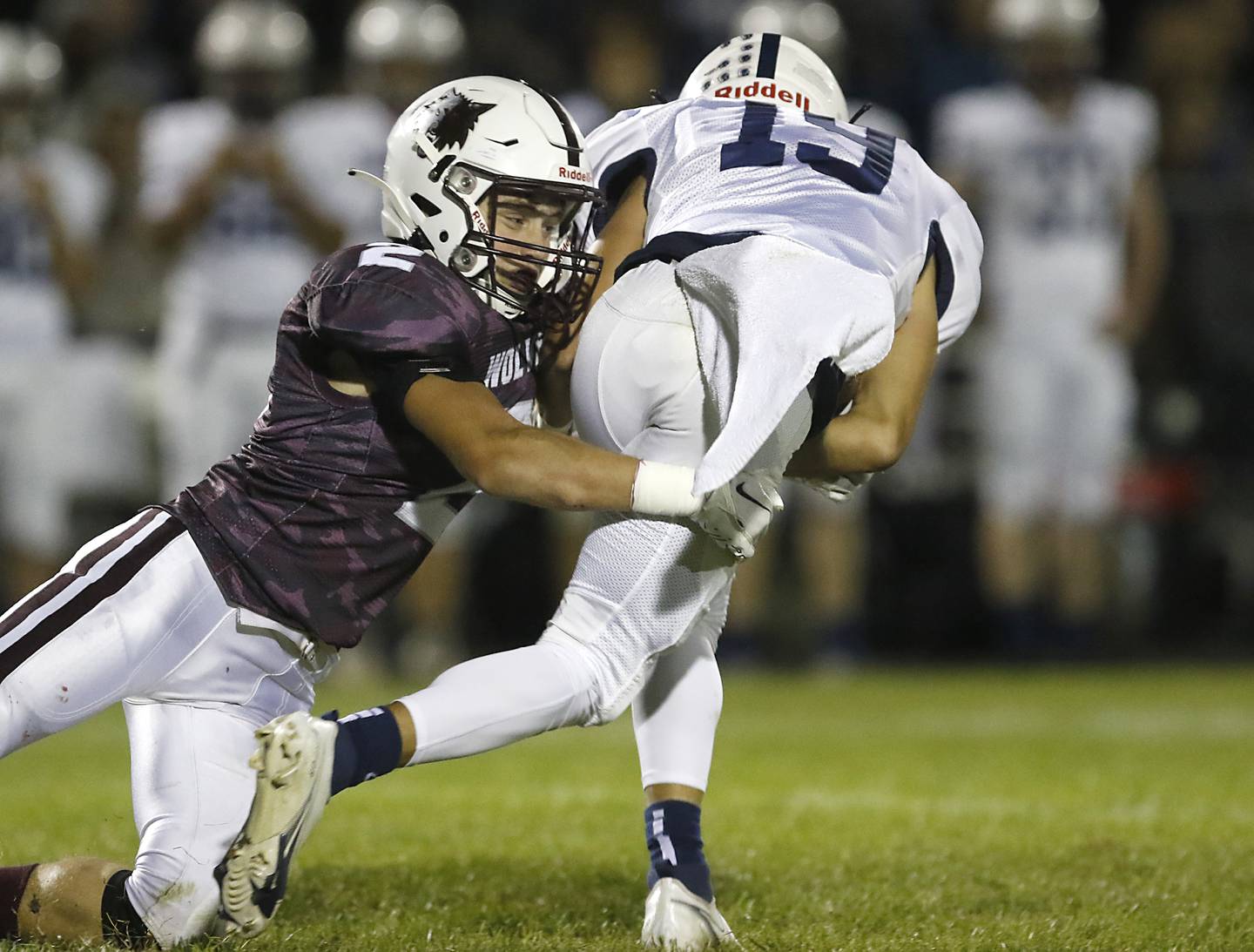 Prairie Ridge's Ryan Koelblinger tackles Cary-Grove's Andrew Prio during a Fox Valley Conference football game between Prairie Ridge  and Cary-Grove Friday, Sept. 23, 2022, at Prairie Ridge High School in Crystal Lake.