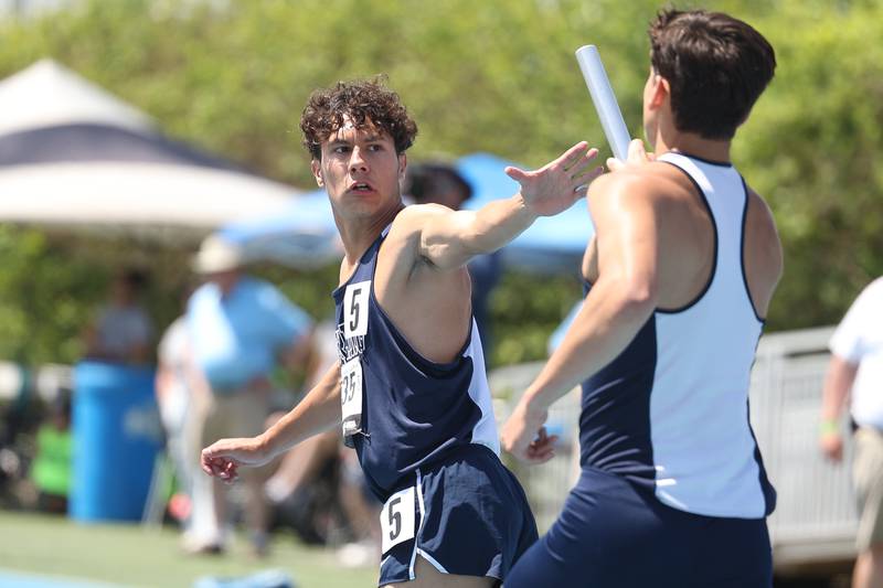 Sterling’s Thomas Holcomb takes the baton in the Class 2A 4x800 Relay State Finals on Saturday, May 27, 2023 in Charleston.