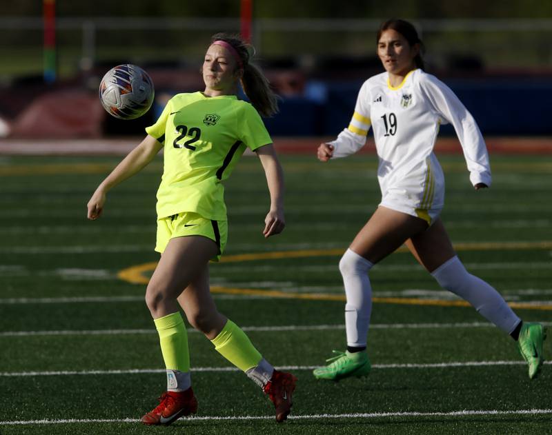 Richmond-Burton's Abbie Leslie controls the ball in front of Harvard's Jackie Silva during the Kishwaukee River Conference Girls Soccer Tournament Championship Match on Wednesday, May 7, 2025, at HRichmond-Burton High School in Richmond.