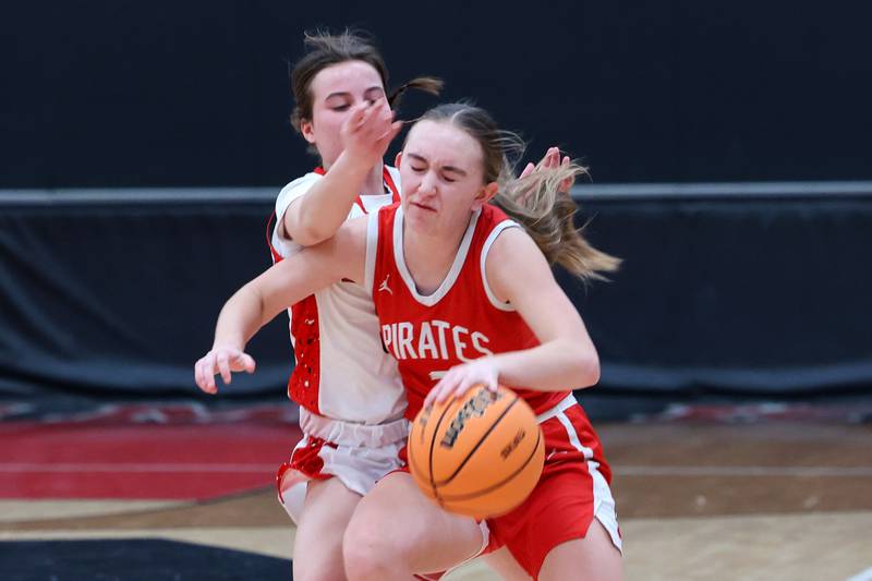 Ottawa's Ashlynn Ganiere is fouled by Bradley-Bourbonnais' Katie McBurnie late in the fourth quarter during Ottawa's 55-44 victory on Monday, Feb. 9, 2026.