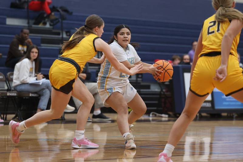 Joliet Catholic’s Breanna Zafra looks for a play against Carmel on Wednesday, Jan 15, 2025 in Joliet.