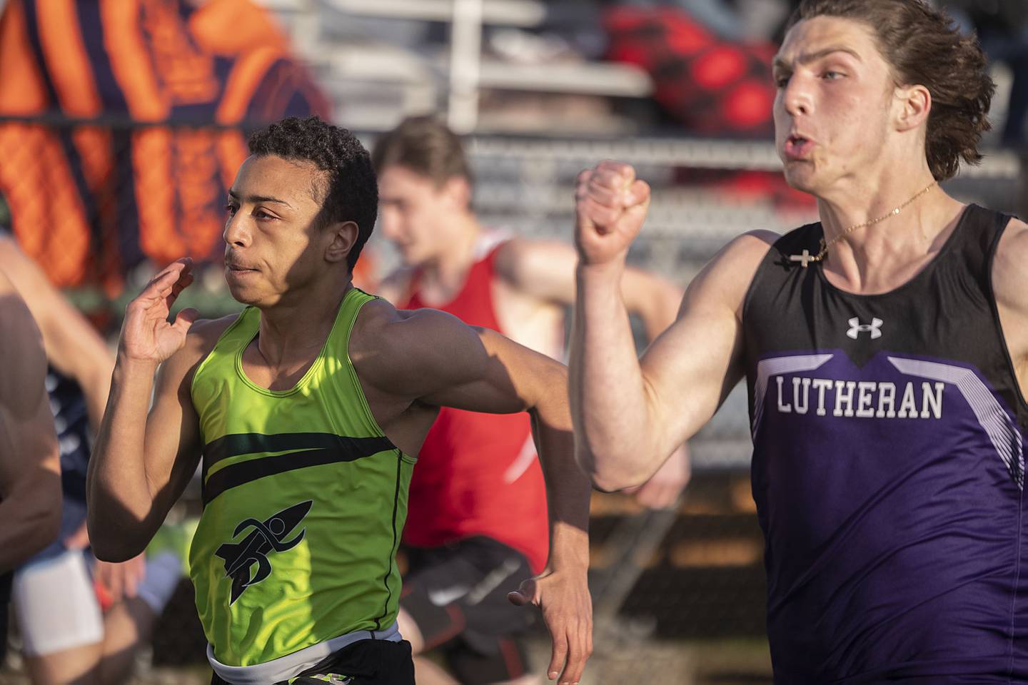 Adan Oquendo of Rock Falls and Rockford Lutheran’s Jack Behmer run neck and neck in the 100 meter dash Friday, April 21, 2023 at the Rock Falls Rocket Invitational.
