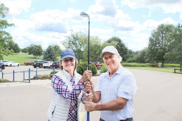 Couples are pair for the golf course at Lake Carroll