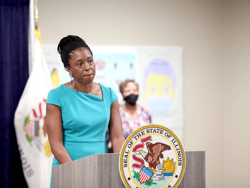Dr. Ngozi Ezike, director of the Illinois Department of Public Health, addresses the media regarding the increased number of Covid-19 cases in Will and Kankakee counties and new restrictions on those areas during a press conference at the Will County Health Department in Joliet on Aug. 25.