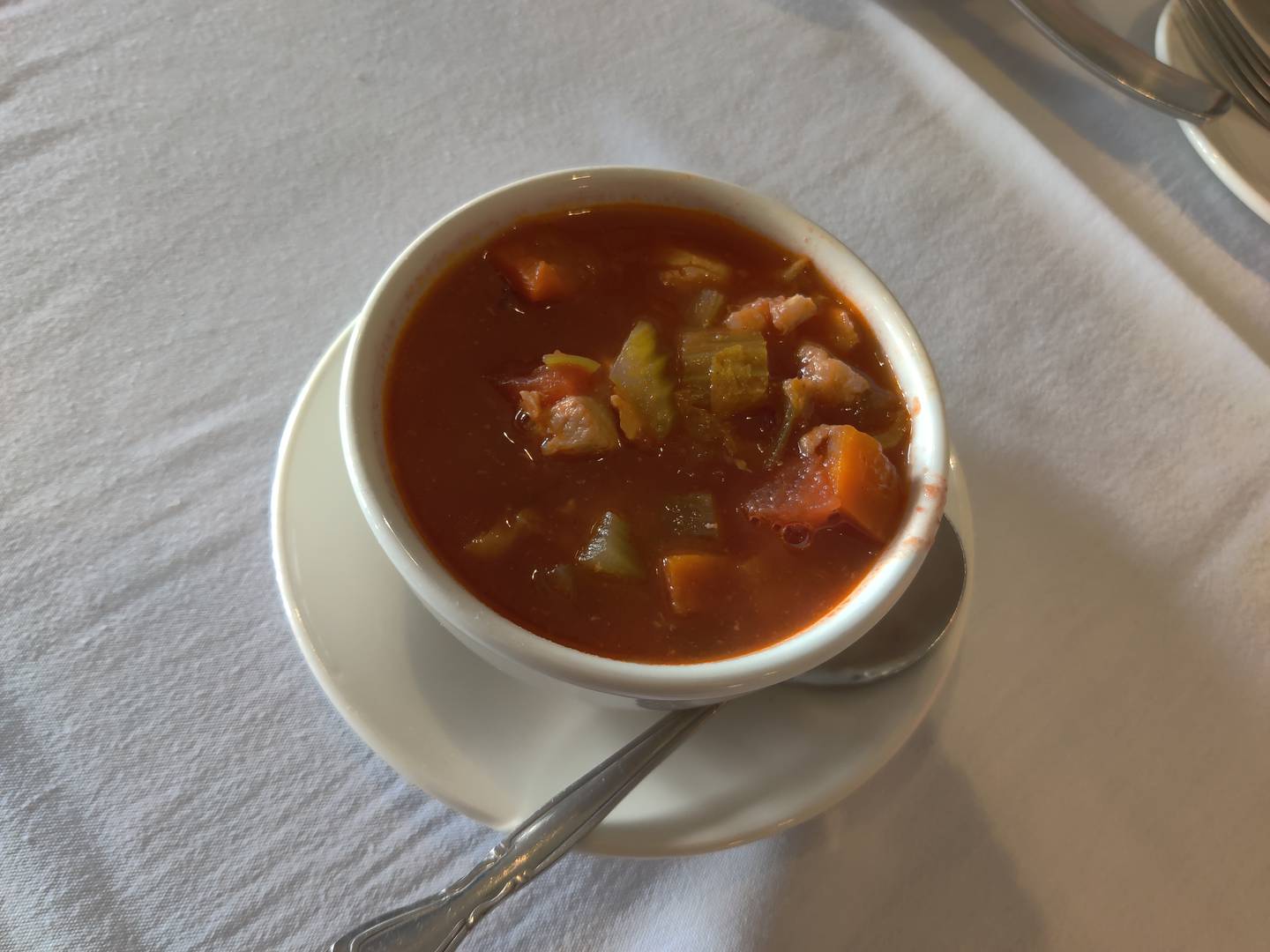Red seafood chowder with scallops at E & S Fish Company in St. Charles