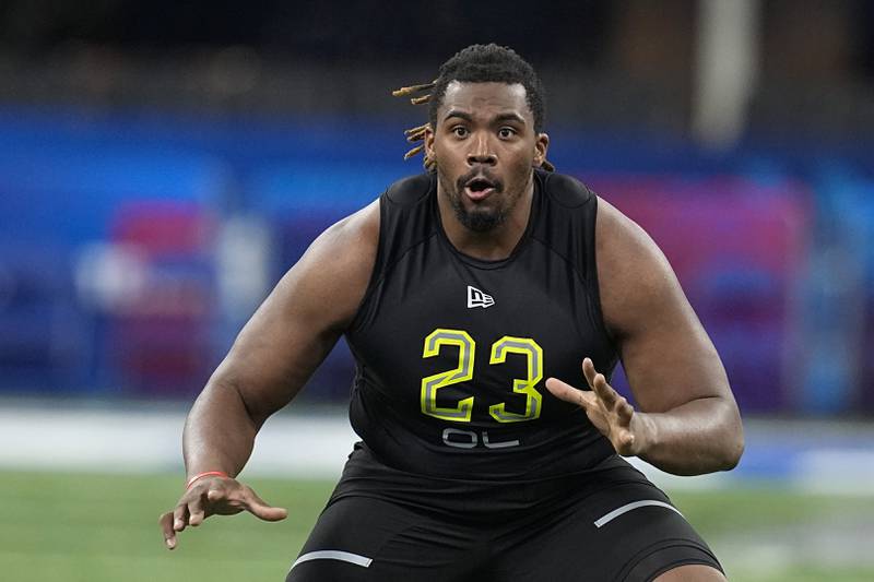 Southern Utah offensive lineman Braxton Jones runs a drill during the NFL combine, Friday, March 4, 2022, in Indianapolis.