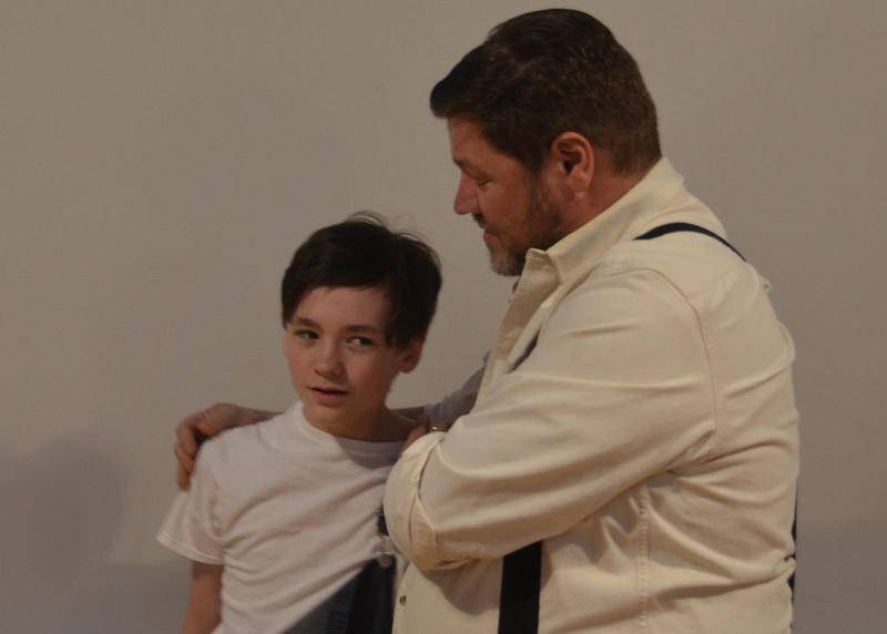 Buddy is comforted by his father, Ferris (played by Wonder Lake's Christopher Plotts).