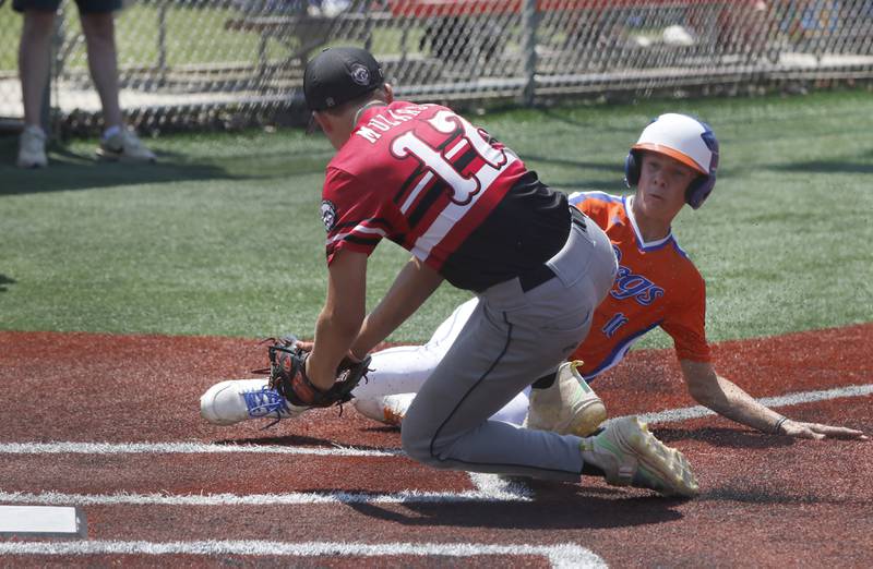 Barrington Broncos Red’s Dane Mularski  tags out the Windy City Hit Dog’s —Offdenkamp’s Colton Snare during a semi-final baseball game against The Barrington Broncos Red in a Under 13 McHenry County Youth Sports Association’s Summer International Championship baseball tournament on Monday, July 14, 2025, at the Mickey Sund Baseball Complex in Crystal Lake's Lippold Park.