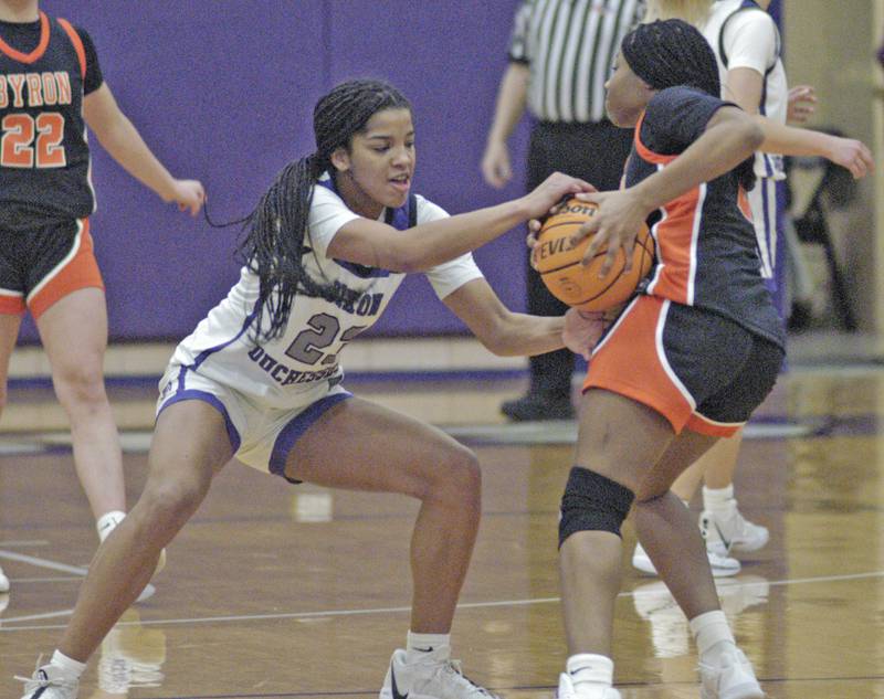 Dixon's Ahmyrie McGowan attempts to grab the ball from a Byron player.  The Dixon Duchesses hosted Byron in girls basketball Saturday, Jan. 25, 2025.
