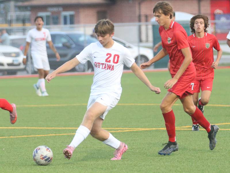 Ottawa's Jacob Phelps kicks the ball away from L-P's Adrian Gonzalez on Monday, Oct. 6, 2025 at the L-P Athletic Complex in La Salle.