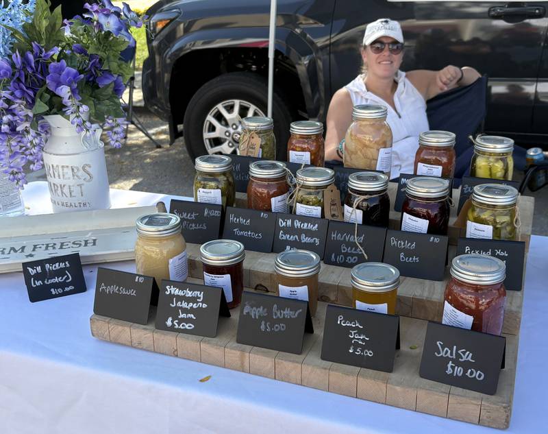 Kristina Jedlink is pictured at her booth at the Huntley Farmers Market Oct. 4, 2025.