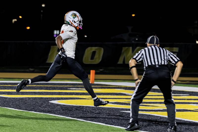 Plainfield East's Markeith Taylor scores a touchdown during a varsity football game against Joliet West at Joliet West on Oct. 10, 2025.