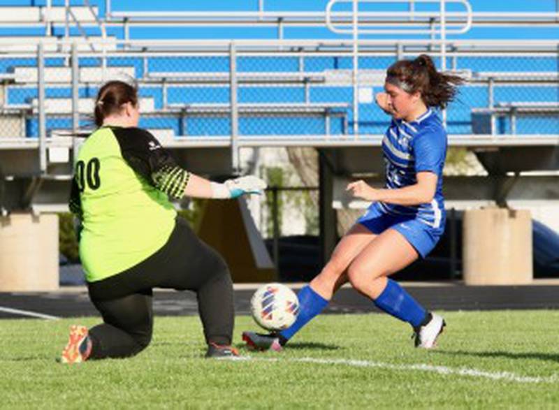 Princeton's Olivia Sandoval attacks L-P keeper Lily Higgins Tuesday night at Bryant Field. Sandoval scored the Tigresses' only goal in a 6-1 loss