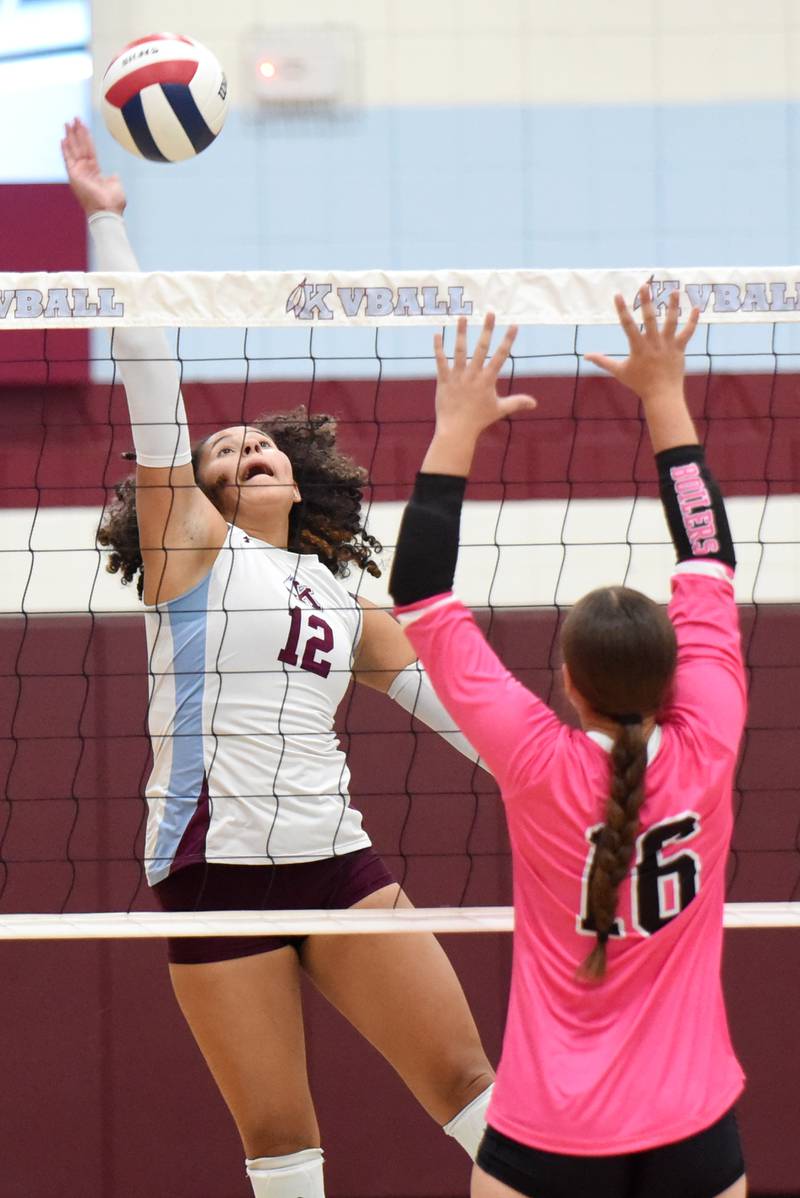 Kankakee's Malea Harrison, left, sends the ball over the net as Bradley-Bourbonnais' Olivia Woolman, right, times her block during All-City action at Kankakee Tuesday, Sept. 9, 2025.