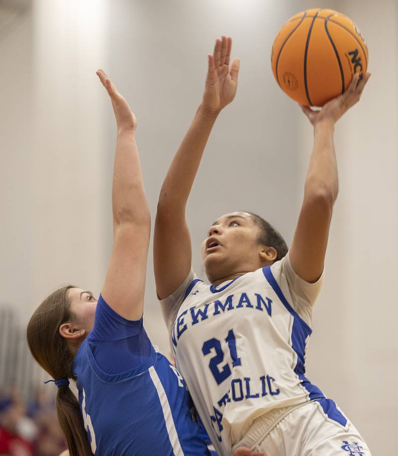 Newman’s Gisselle Martin puts up a shot over Galena’s Chesnie Rosenthal  Tuesday, Feb. 24, 2026, in the Class 1A sectional at Eastland High School.