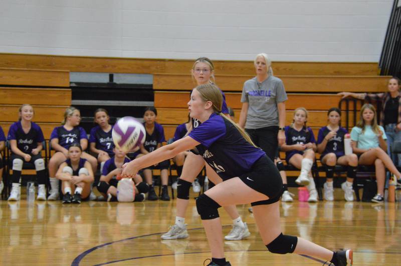 Rochelle's Lily Erickson passes the ball during a seventh-grade volleyball match with Prairie Knolls.