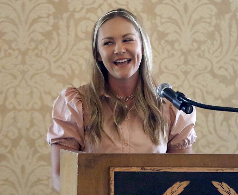 Award recipient Laura Dzielski-Johnson speaks during the Northwest Herald's Women of Distinction award luncheon Wednesday June 7, 2023, at Boulder Ridge Country Club, in Lake in the Hills. The luncheon recognized 10 women in the community as Women of Distinction.