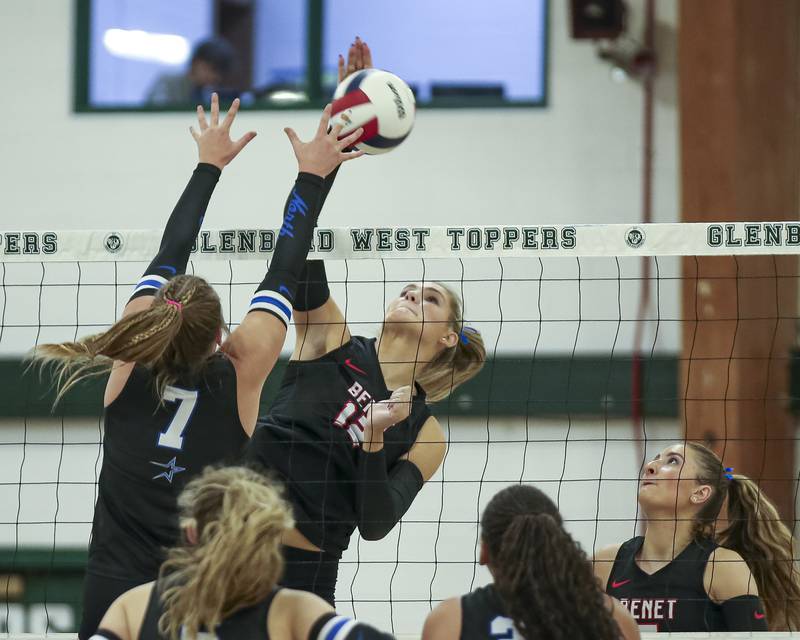 Benet's Carolyn Tarnow (12) goes for a kill during Class 4A Glenbard West Sectional final volleyball match between St Charles North at Benet. Nov 6, 2025 in Glen Ellyn.