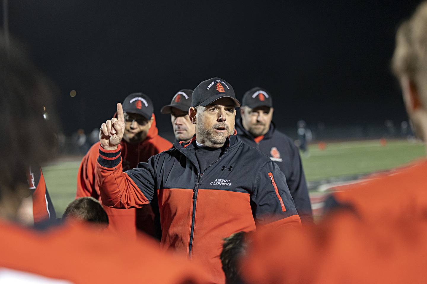 Amboy head coach Scott Payne talks to his team after winning the I8FA championship Friday, Nov.17, 2023 at Monmouth College against Ridgewood.