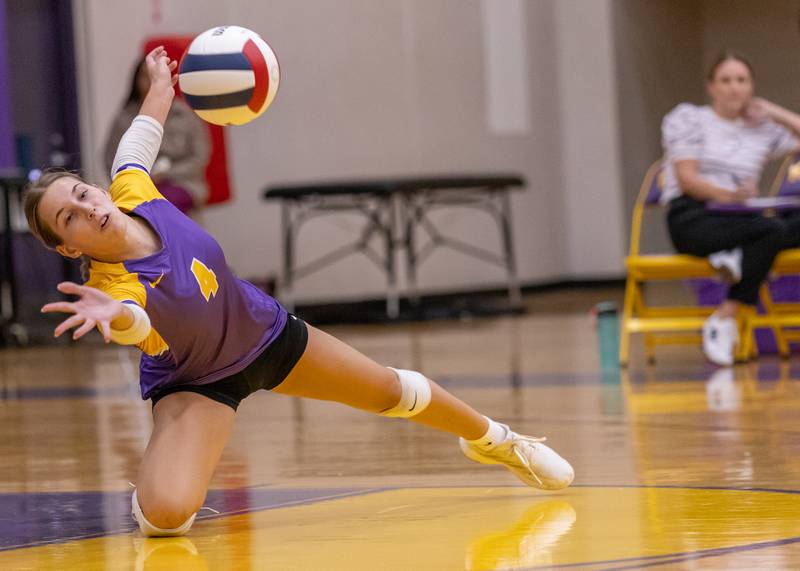 Laylie Denault dives for the ball in attempt to save the point against Hall High School during the match at Auxiliary Gym on September 2, 2025 at Mendota High School.