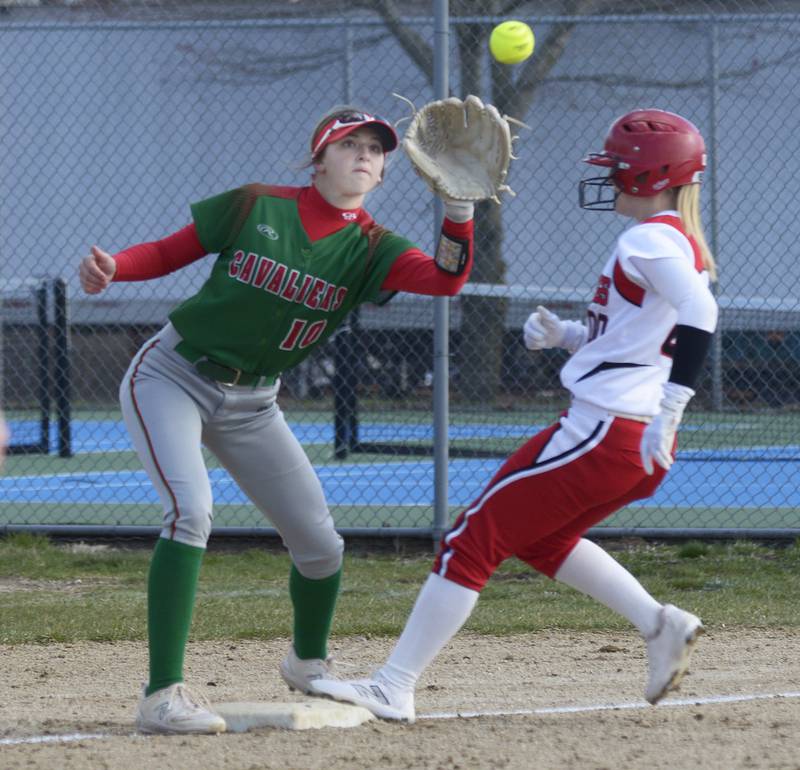 La Salle Peru’s Kelsey Frederick awaits a throw as Streator’s Lily Kupec gets in safely in the 3rd inning Wednesday at Streator.