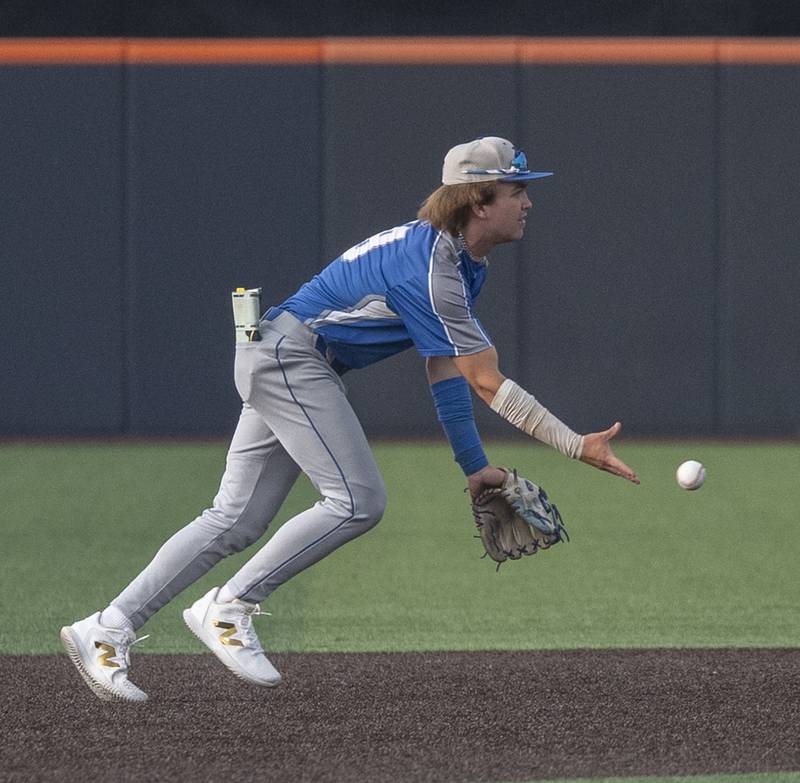 Newman’s Garet Wolfe flips the ball to second for an out against Teutopolis Friday, June 6, 2025, during the Class 2A state semifinal at Illinois Field in Champaign.