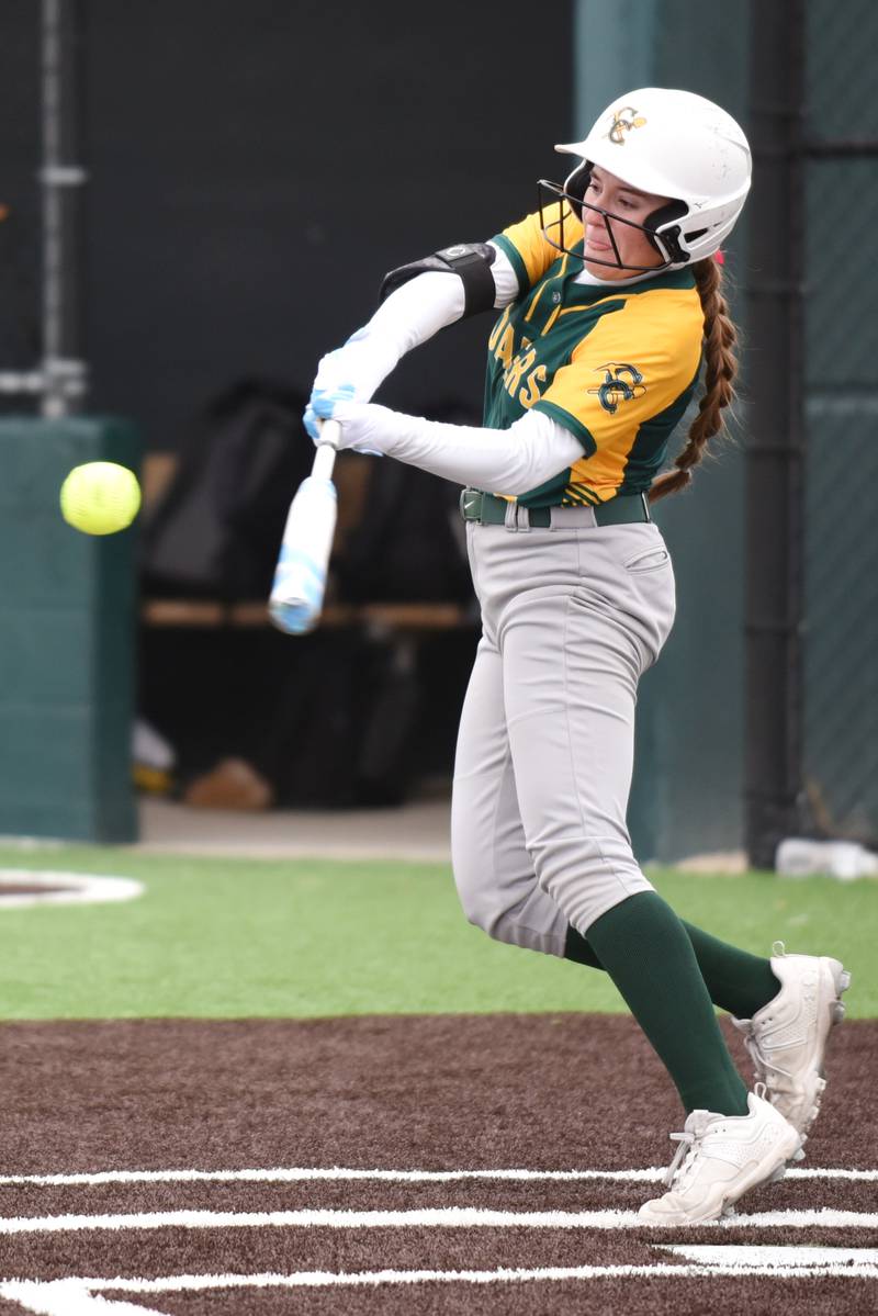 Coal City's Madi Petersen hits a pitch during a home game against Peotone Wednesday, April 9, 2025.