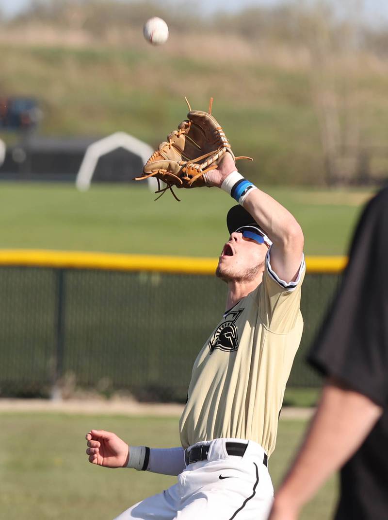 Sycamore's Hunter Britz catches a popup during their game against Kaneland Thursday, May 4, 2023, at Kaneland High School.