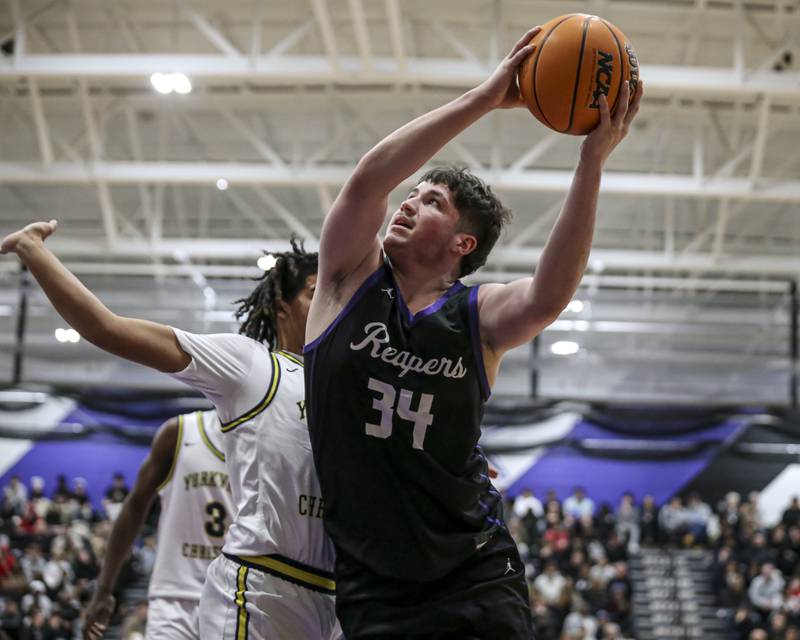 Plano's Kevin Martinez (34) puts in a lay up during their Plano Christmas Classic semi-final basketball game between Yorkville Christian at Plano Monday, Dec 29, 2025 in Plano.