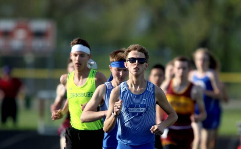 Woodstock’s Dylan Hanson leads the 3200-meter run during Kishwaukee River Conference track meet action at Marengo Tuesday night.