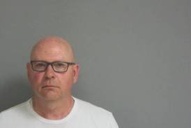 Utica man, Ottawa woman charged in money laundering scheme
