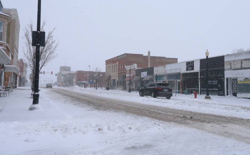 Traffic moves in the snow along North Main Street on Monday, March 16, 2026 in Princeton.