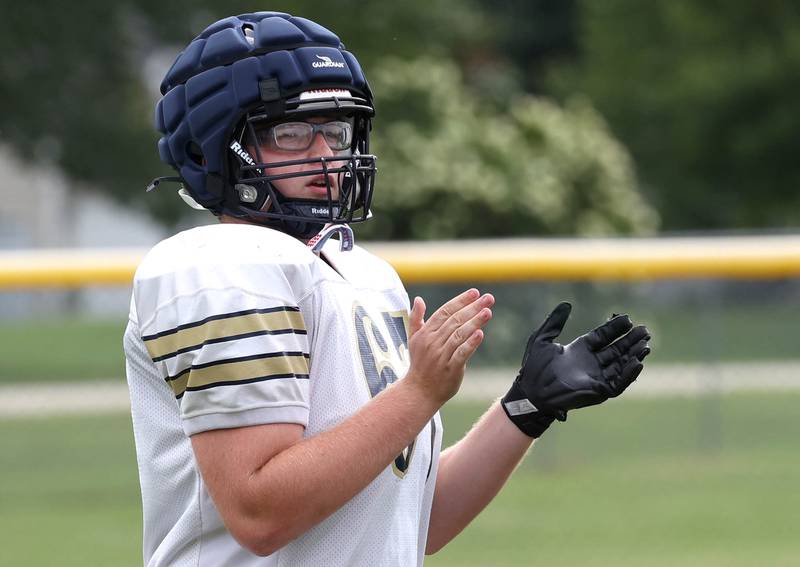 Hiawatha’s Alex Panzer claps Tuesday, Aug. 19, 2025, during practice at the school in Kirkland.