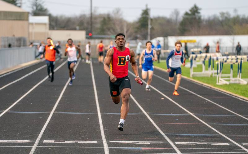 Batavia’s Jalen Buckley crosses the finish line in the 4x100 relay during the Roger Wilcox Track and Field Invitational at Oswego High School on Friday, April 29, 2022.