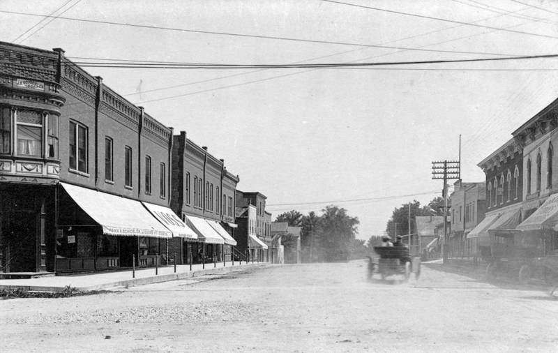 Oswego’s dusty Main Street in 1910 has given way to modern shops, offices, and restaurants. Find out how Oswego’s historic downtown business district evolved during the past century and a half as the Oswegoland Heritage Association, in partnership with the Oswegoland Park District presents “Oswego History Tour – Downtown” at noon Sunday, June 12.