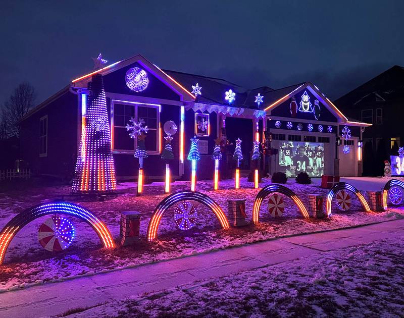 A Chicago Bears light show put together by Tim Caravia and his family plays Friday, Jan. 16, 2025, at his home on Dustin Drive in Sycamore. The show will run from 5:30 to 9:00 p.m. most days until the Bears season ends.