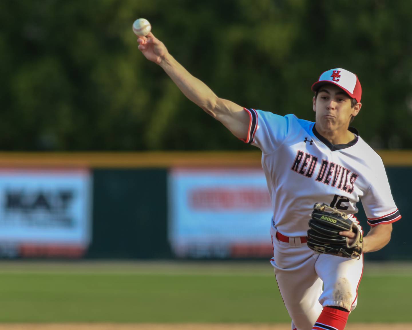 Hinsdale Central's Lucas Montesantos (12) delivers a pitch during baseball game between Lyons at Hinsdale Central. April 19, 2022.