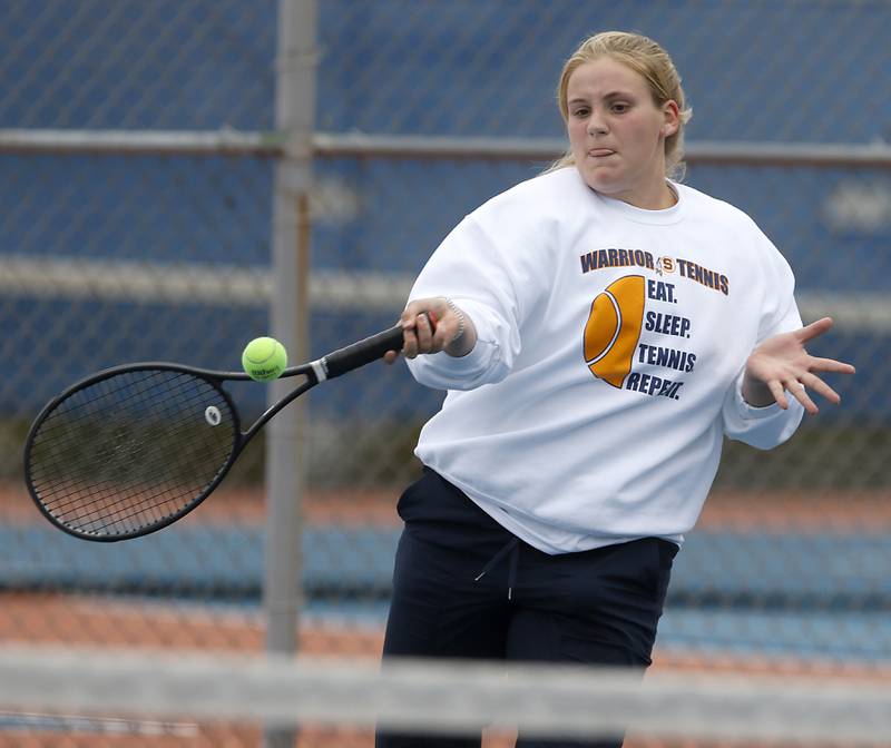 Sterling’s Ellie Aitken returns the ball Thursday, Oct. 20, 2022, during during the first day of the IHSA State Girls Tennis Tournament at Hoffman Estates High School in Hoffman Estates.