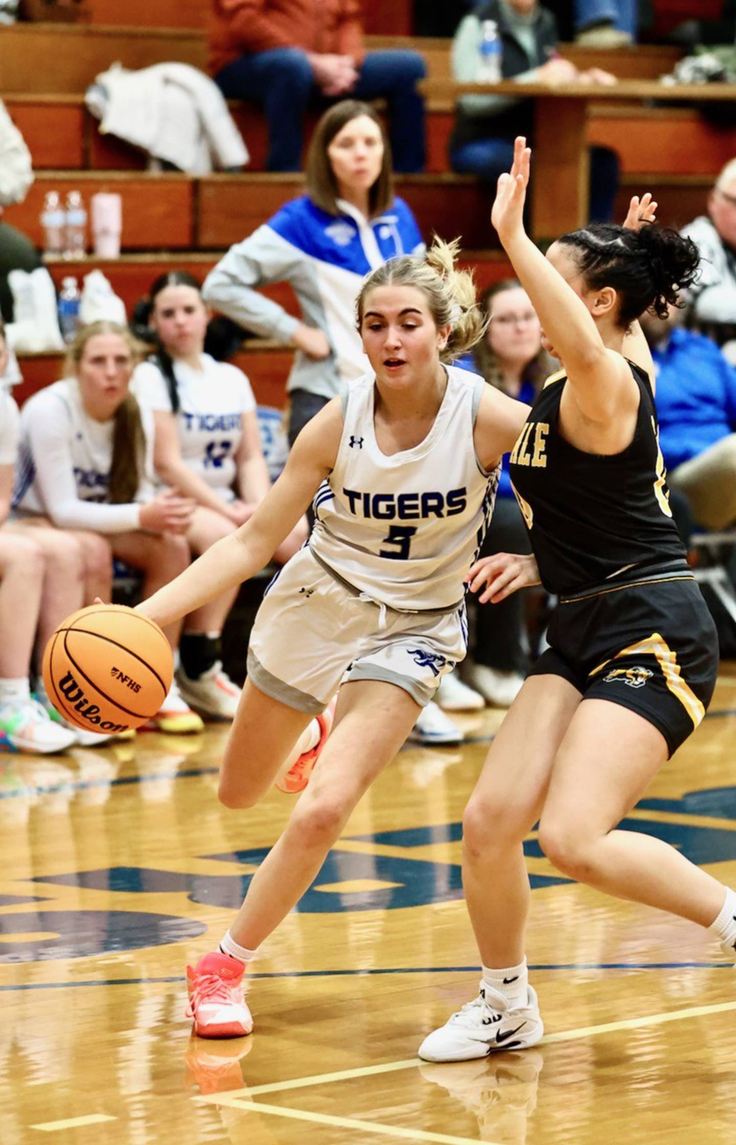 Princeton's Kiyrra Morris drives against Riverdale's Amarah Coleman Tuesday night at Prouty Gym.